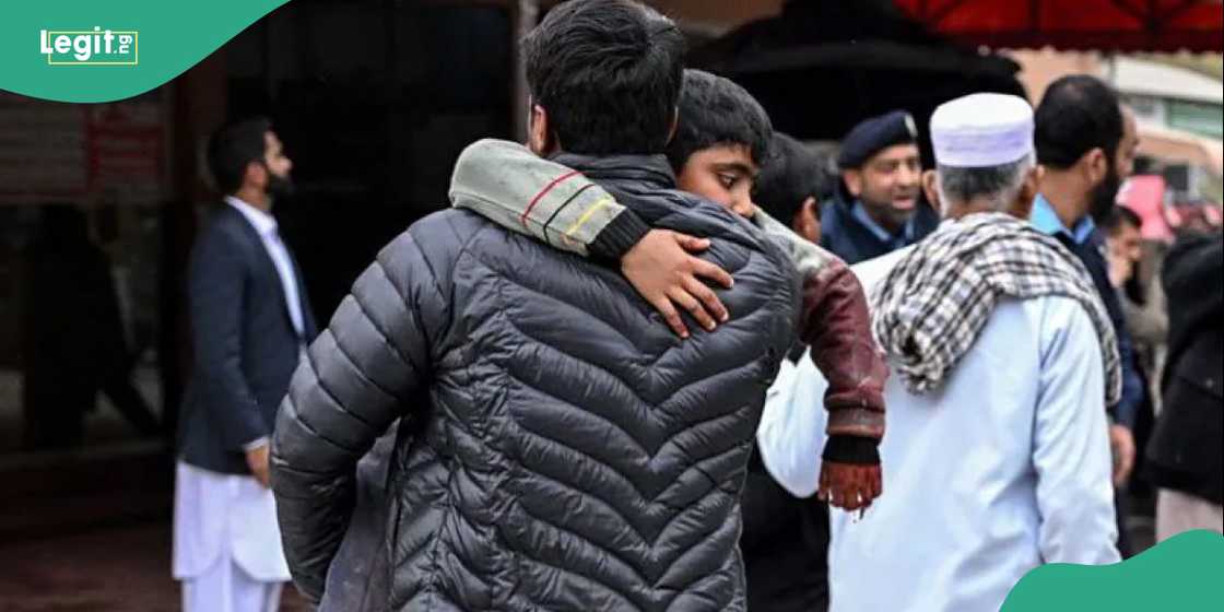 Security personnel stand guard outside a mosque following an explosion in Islamabad.