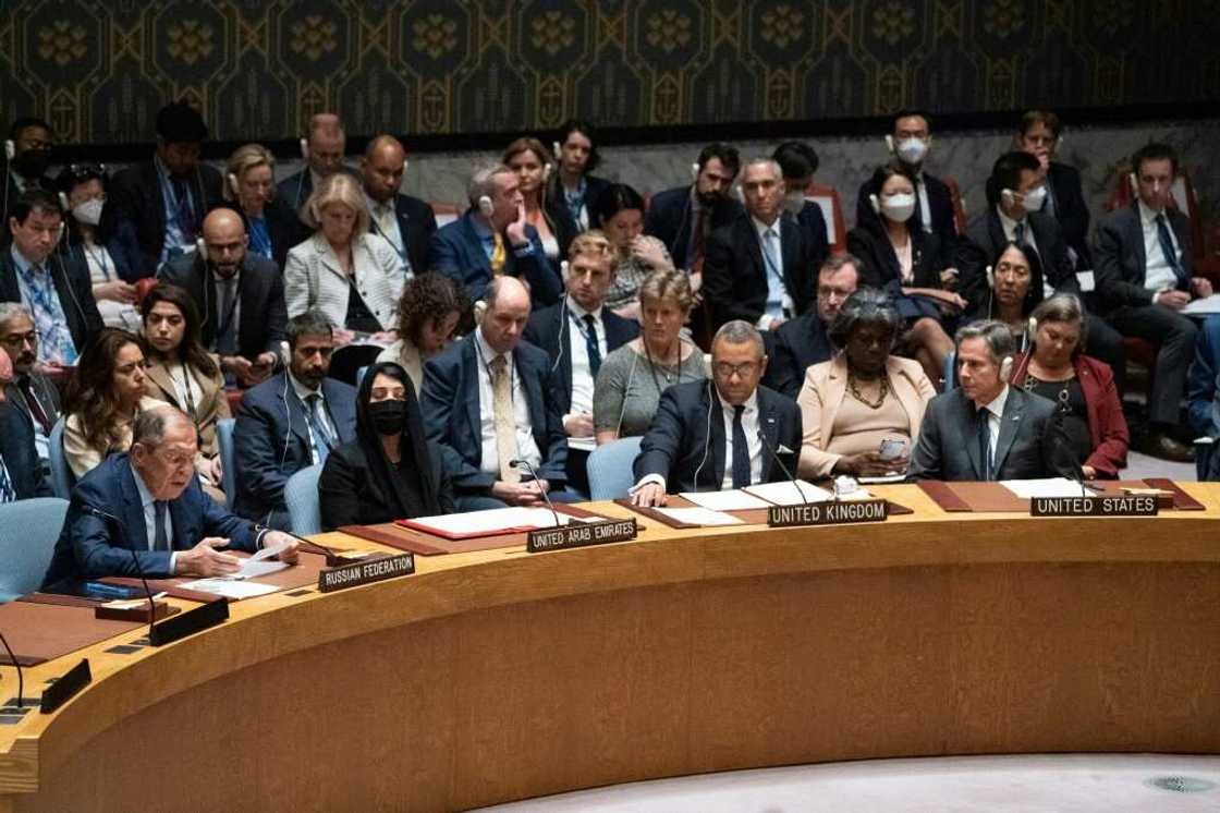 Russian Foreign Minister Sergei Lavrov (left) speaks at a Security Council session on Ukraine as US Secretary of State Antony Blinken listens on September 22, 2022