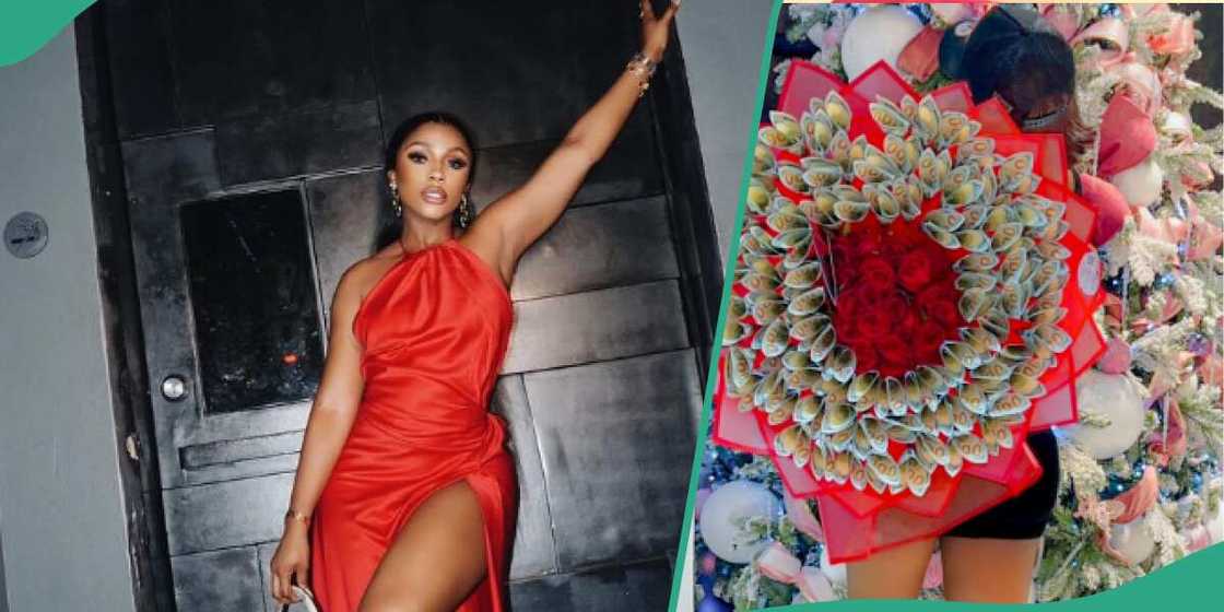 Mercy Eke shows off dollar bouquet from her mystery man. Mercy Eke shows off dollar bouquet from her mystery man.