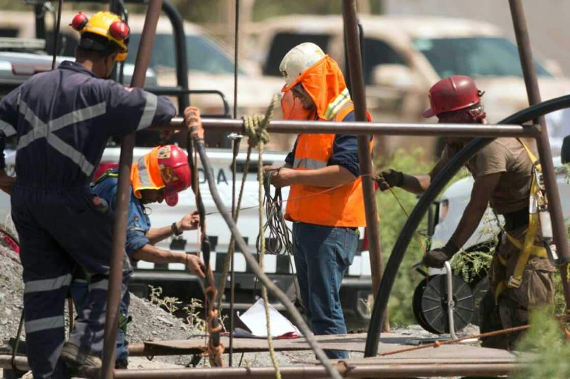 Rescue personnel work in the flooded coal mine where 10 miners have been trapped after a landslide, in the community of Agujita, Municipality of Sabinas, Coahuila State, Mexico Rescue personnel work in the flooded coal mine where 10 miners have been trapped after a landslide, in the community of Agujita, Municipality of Sabinas, Coahuila State, Mexico