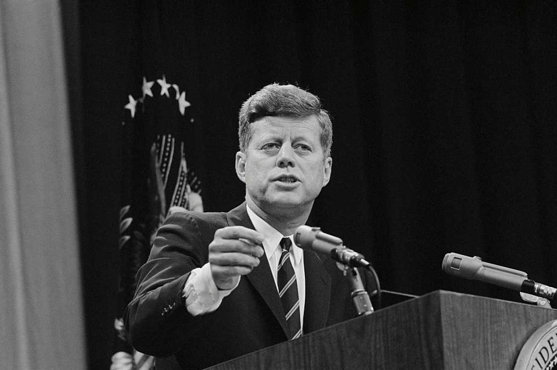 John F. Kennedy at a press John F. Kennedy at a press