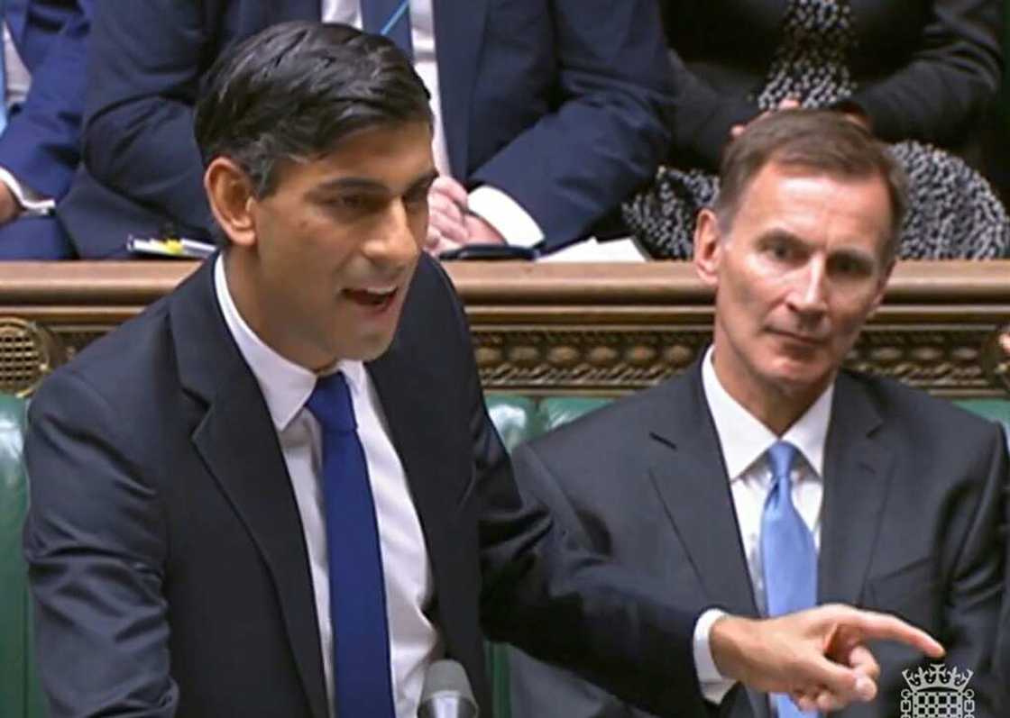 Finance minister Jeremy Hunt (R) has dampened hopes of tax cuts as Prime Minister Rishi Sunak's (L) Conservatives trail in opinion polls Finance minister Jeremy Hunt (R) has dampened hopes of tax cuts as Prime Minister Rishi Sunak's (L) Conservatives trail in opinion polls