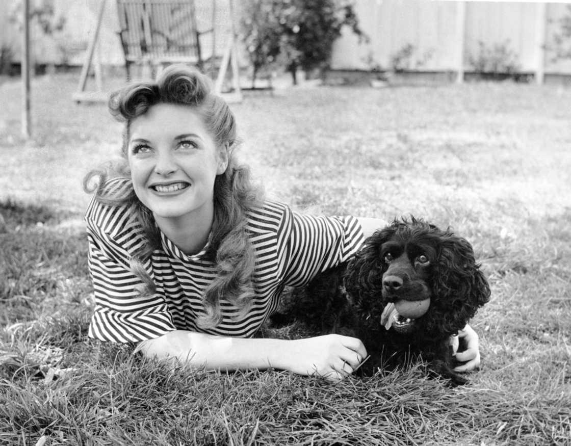 American singer and actress Julie London with Rory Calhoun's dog Roxanne, 1946 American singer and actress Julie London with Rory Calhoun's dog Roxanne, 1946