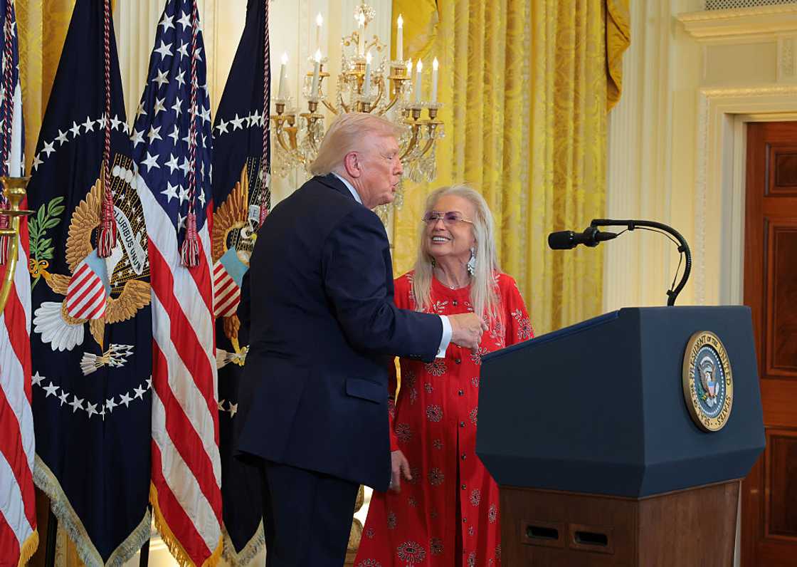 U.S. President Donald Trump (L) and Miriam Adelson (R)