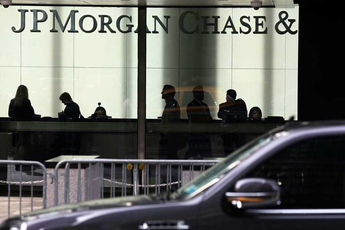 JPMorgan Chase reported lower quarterly profits as it set aside more funds in case of bad loans JPMorgan Chase reported lower quarterly profits as it set aside more funds in case of bad loans