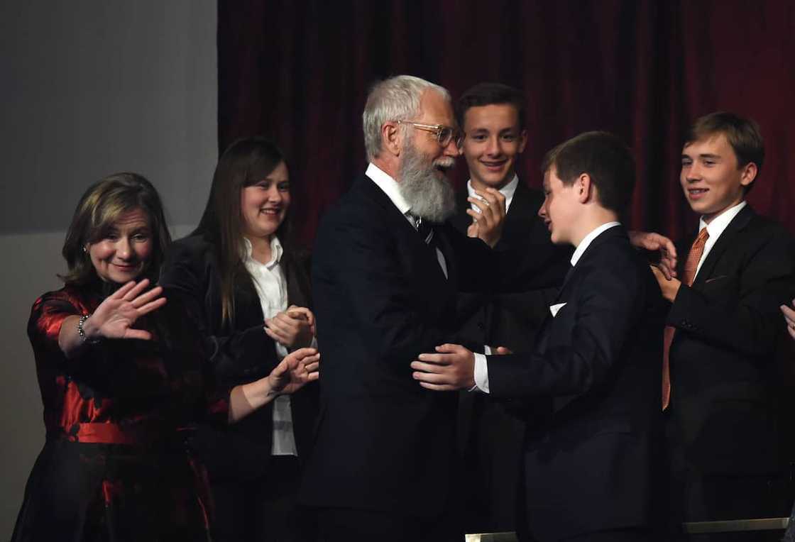 David Letterman, with wife Regina Lasko, greets his son Harry during the show at the 20th Annual Mark Twain Prize for American Humor in Washington
