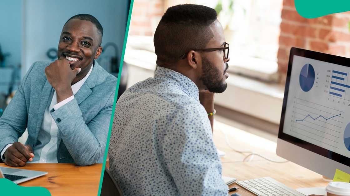 Man smiles in an office and another staring at the computer