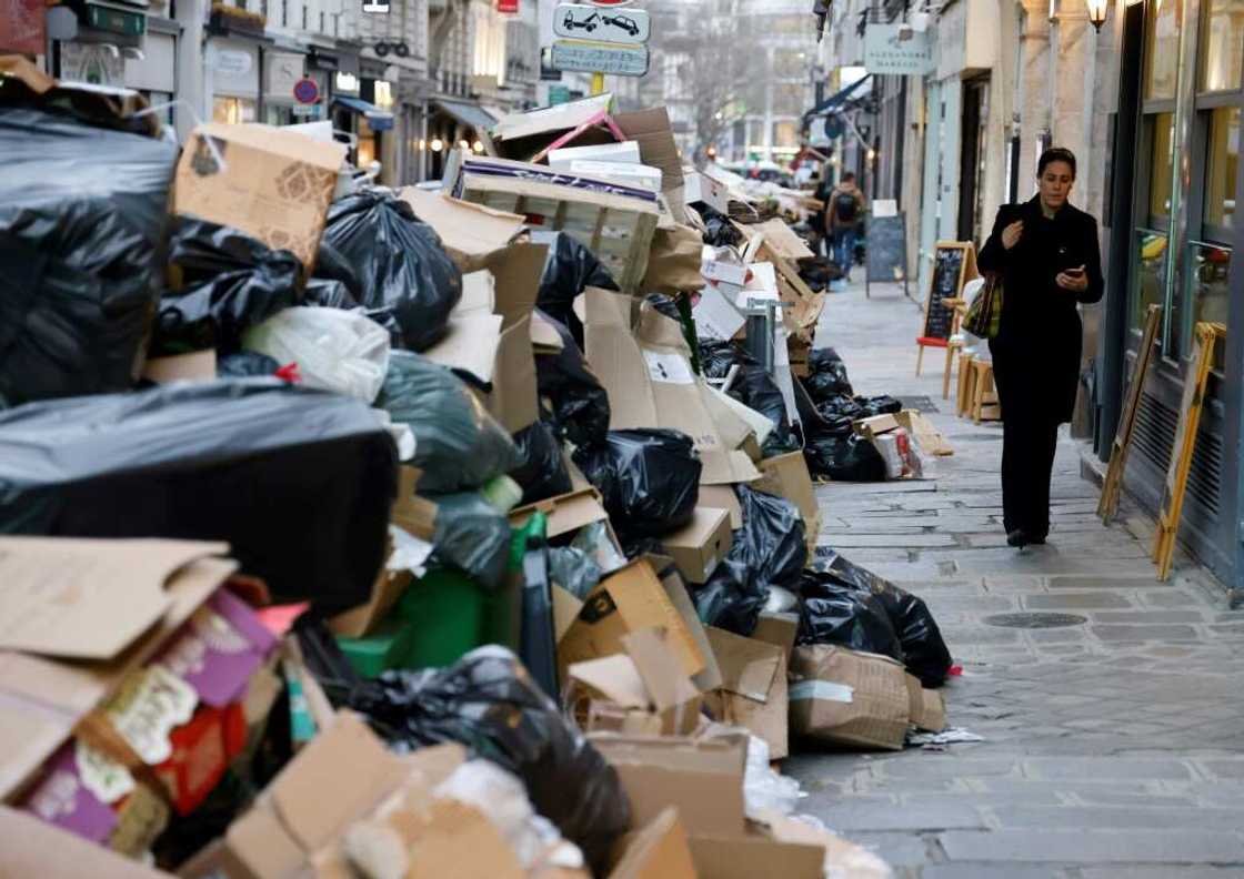 Garbage is piled up several metres high in some areas of Paris due to a strike by municipal waste collectors Garbage is piled up several metres high in some areas of Paris due to a strike by municipal waste collectors
