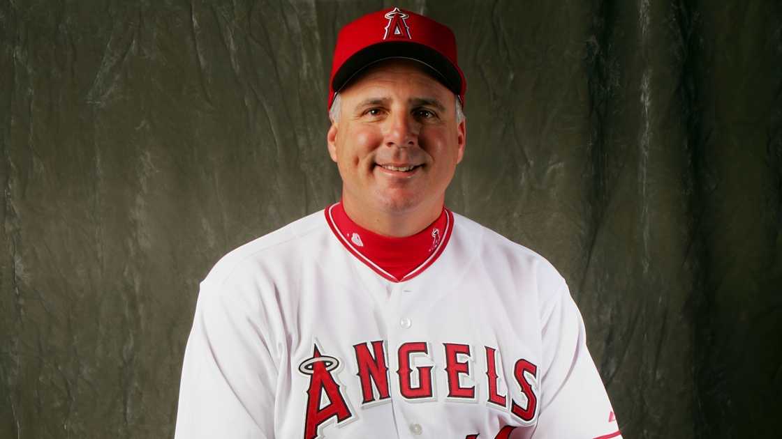 Los Angeles Angels manager Mike Scioscia poses sitting during the Anaheim Media Day.