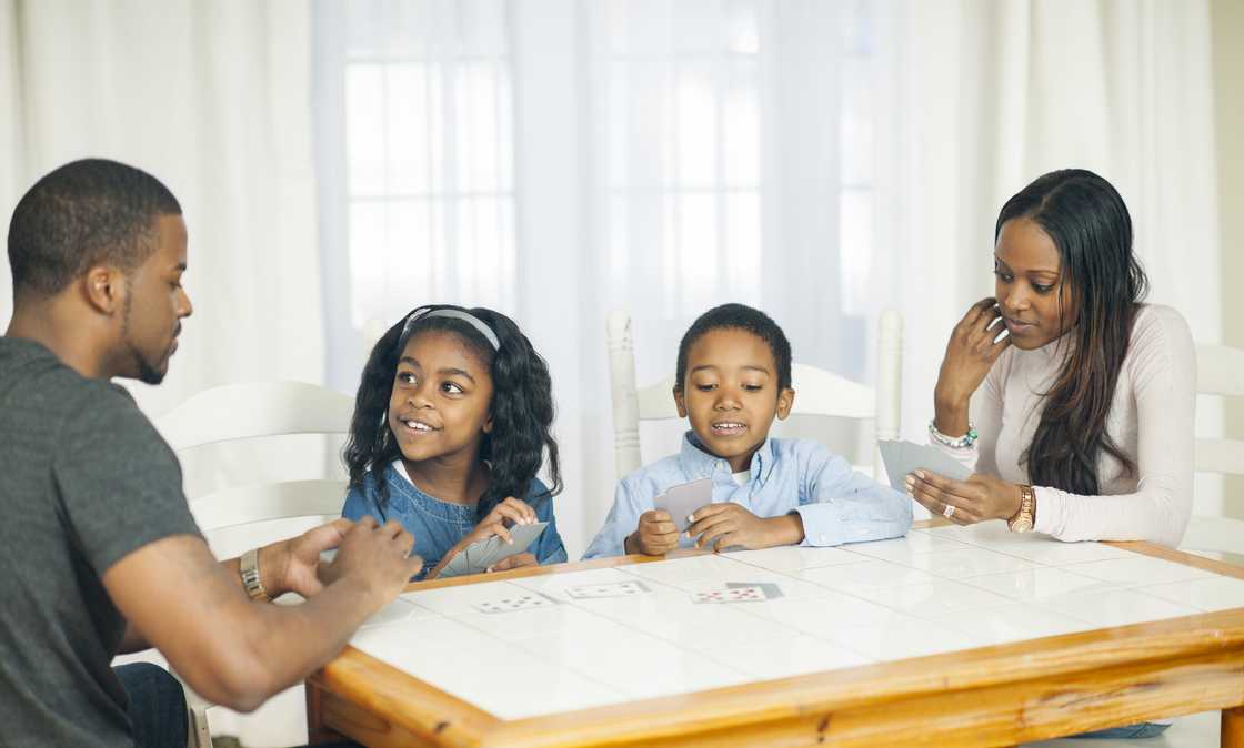 A family playing games on the table