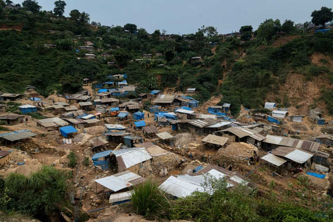 In the town of Kamituga, some 40 kilometres (25 miles) from Kitutu, gold mining is in full throttle In the town of Kamituga, some 40 kilometres (25 miles) from Kitutu, gold mining is in full throttle