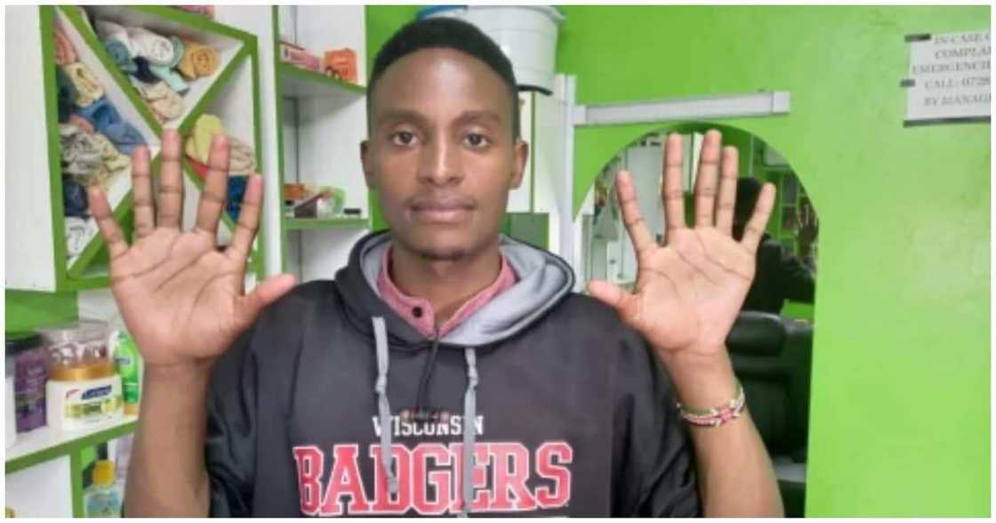 James Kamau, 6 fingers on both hands, masseur, Nakuru County, Kenya, 28-year-old