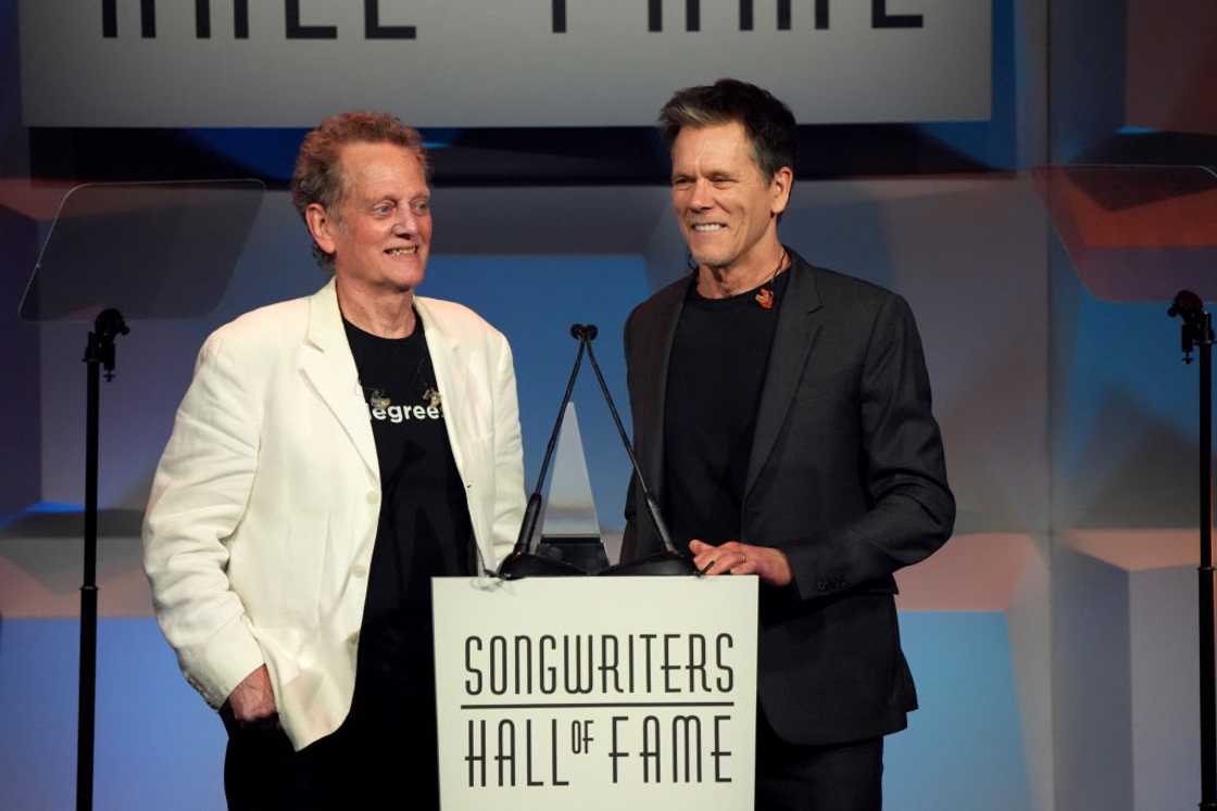 Brother Kevin (R) and Michael Bacon appear together at an event Brother Kevin (R) and Michael Bacon appear together at an event