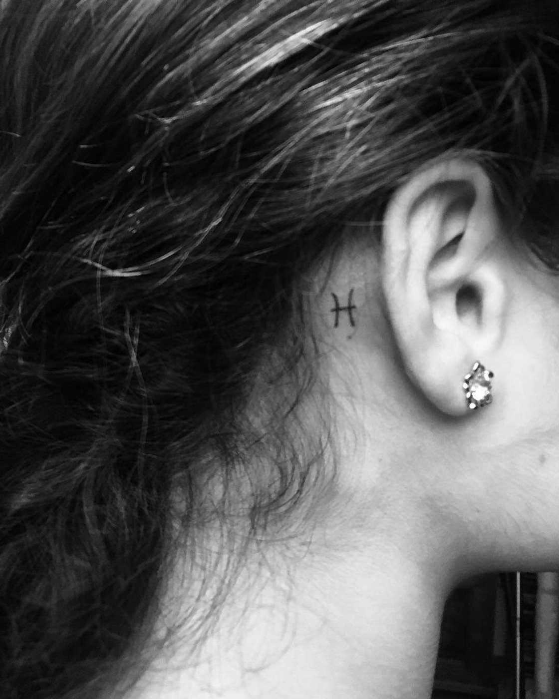 Pisces sign tatto Pisces sign tatto