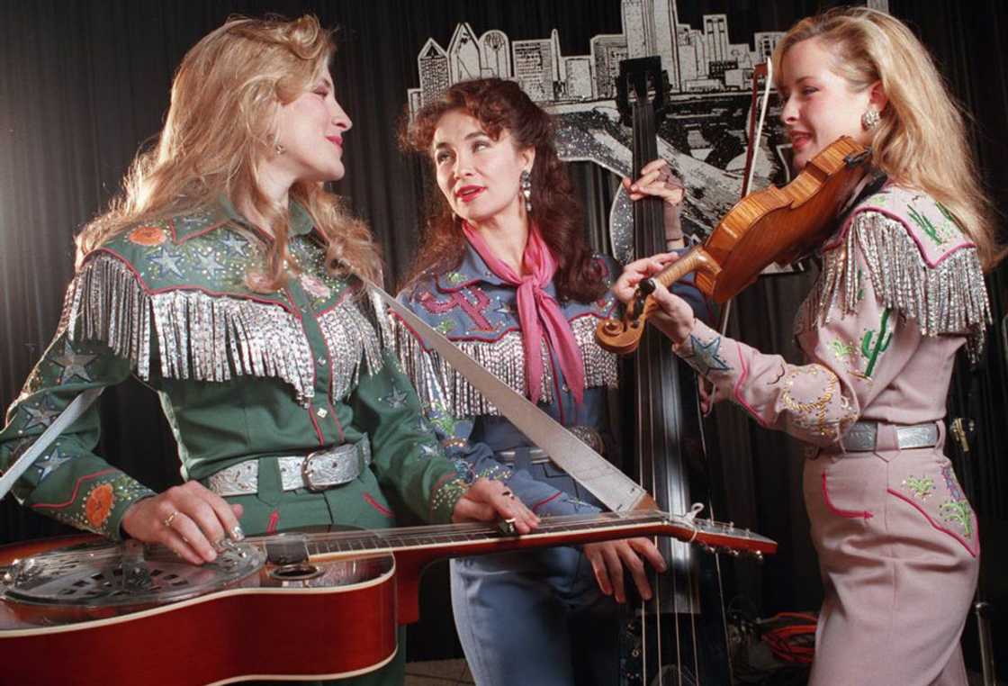 Emily Erwin, Laura Lynch and Martie Erwin performing on stage in Dallas Emily Erwin, Laura Lynch and Martie Erwin performing on stage in Dallas