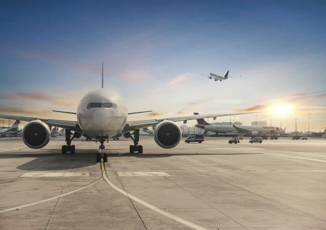 An American Airlines plane engine caught fire at Denver International Airport, forcing passengers to evacuate onto the wing.