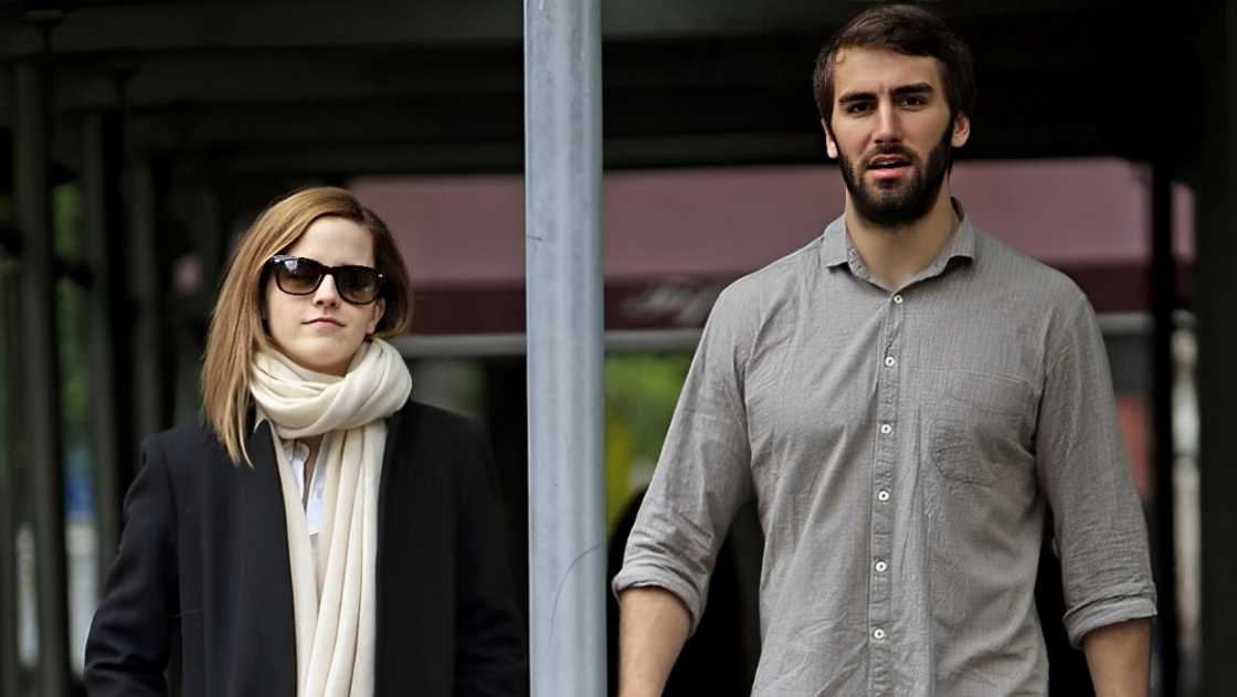 Emma Watson and her beau Matthew Janney pictured walking together. Emma Watson and her beau Matthew Janney pictured walking together.