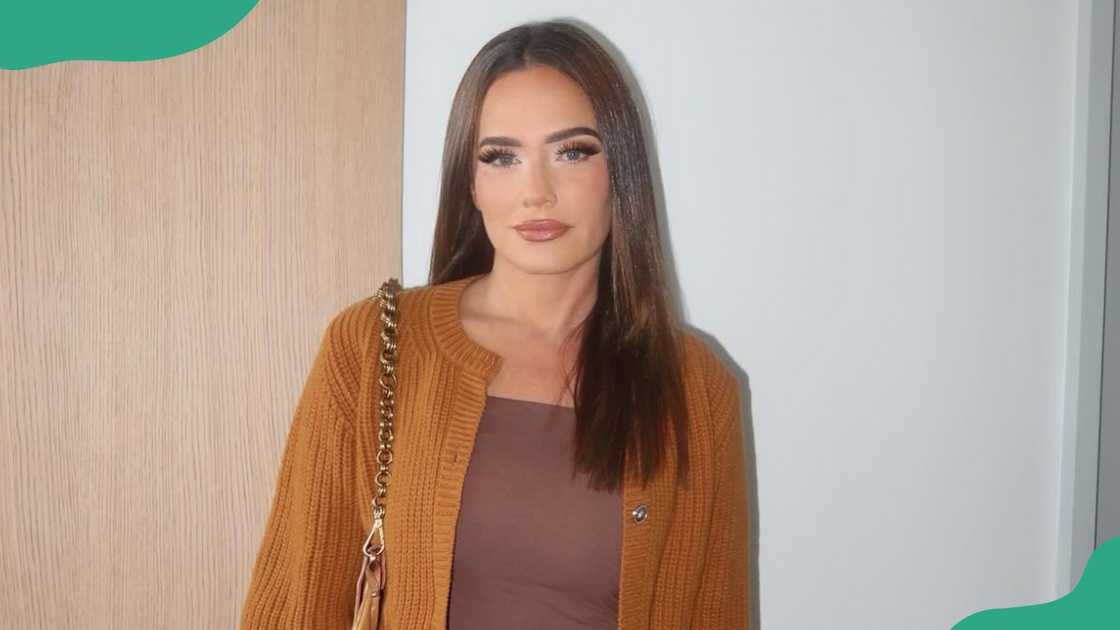 Meredith Marks in mustard cardigan. Meredith Marks in mustard cardigan.