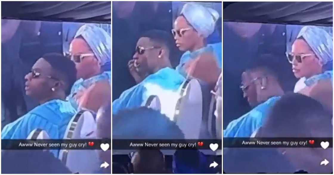 Wizkid crying at his mother's burial. Wizkid crying at his mother's burial.