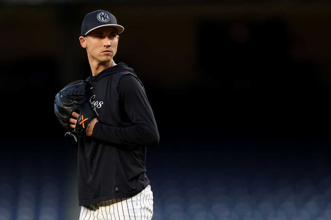 Luke Weaver of the New York Yankees warms up before an MLB game