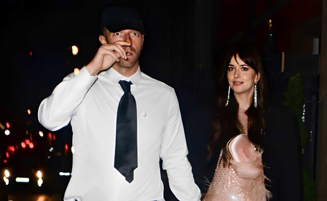 Musician Chris Martin and actress Dakota Johnson Musician Chris Martin and actress Dakota Johnson
