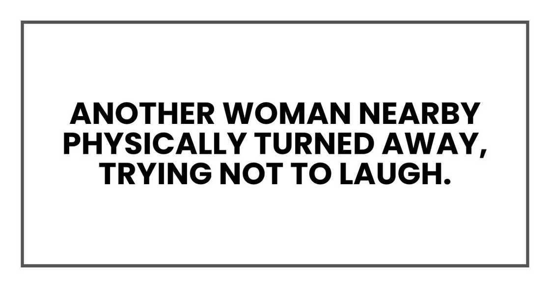 Another woman nearby physically turned away, trying not to laugh. Another woman nearby physically turned away, trying not to laugh.