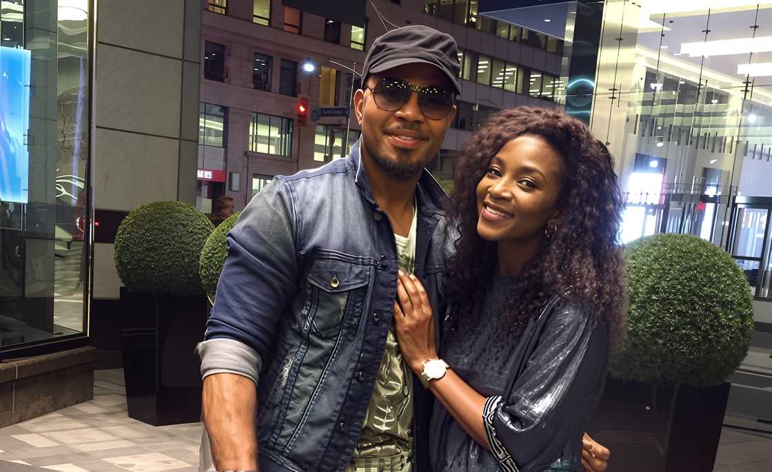 Ramsey Nouah and Genevieve Nnaji hold each other in a pose Ramsey Nouah and Genevieve Nnaji hold each other in a pose