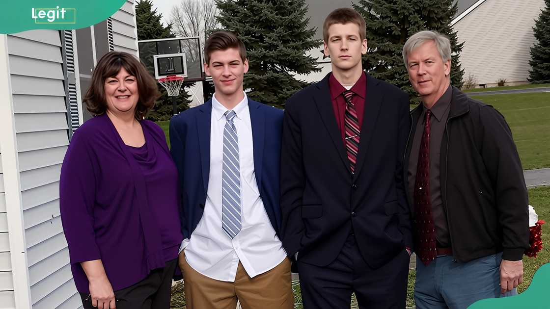 Kyle Filipowski with his brother and his parents, Becky and David Filipowski, posing for a photo in an open field Kyle Filipowski with his brother and his parents, Becky and David Filipowski, posing for a photo in an open field