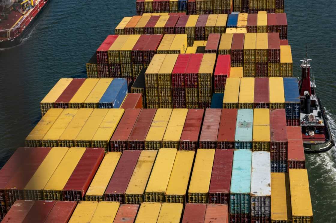 A container ship departs the Port of Newark for the Atlantic Ocean on September 30, 2024 seen from New York City ahead of an expected labor strike