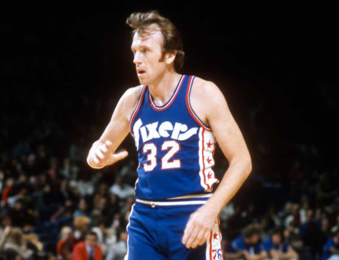 Billy Cunningham looks on against the Baltimore Bullets during an NBA basketball game Billy Cunningham looks on against the Baltimore Bullets during an NBA basketball game