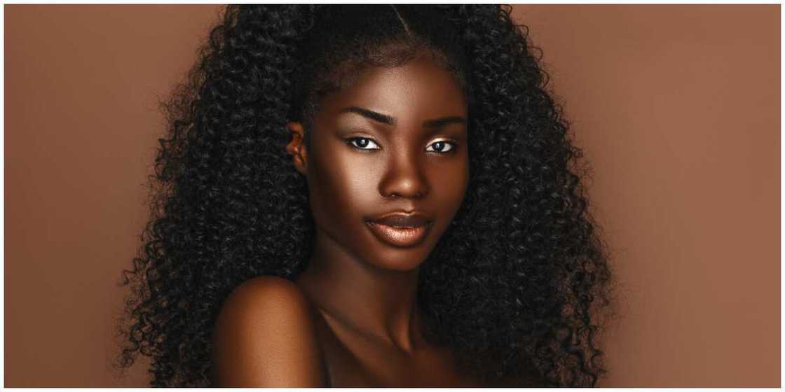 A photo of a dark-skinned model. A photo of a dark-skinned model.