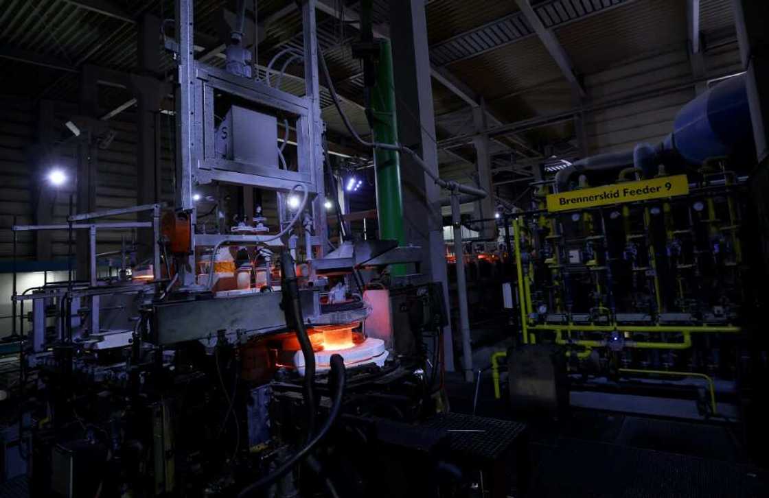 To make glass, sand is heated to temperatures of up to 1,600 degrees Celsius (2,912 degrees Fahrenheit) and gas is the most frequently chosen source of energy To make glass, sand is heated to temperatures of up to 1,600 degrees Celsius (2,912 degrees Fahrenheit) and gas is the most frequently chosen source of energy