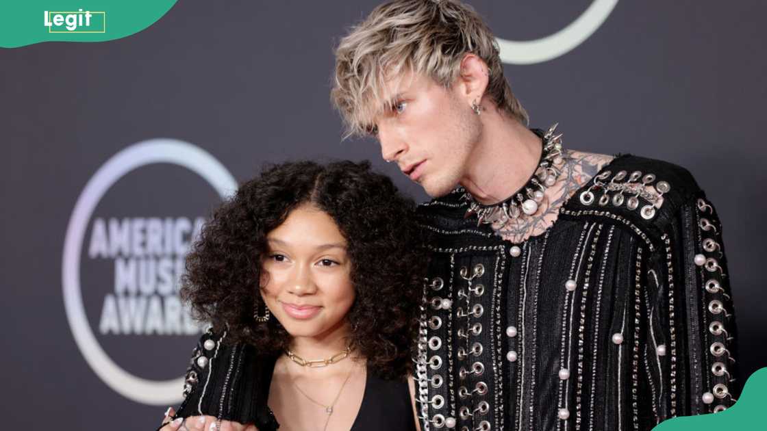 Casie Colson (L) and his father at the American Music Awards Casie Colson (L) and his father at the American Music Awards