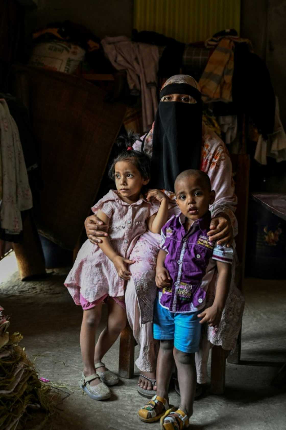 Widowed: Rekha Akter and her children. Her husband was a safety supervisor at a Chittagong yard Widowed: Rekha Akter and her children. Her husband was a safety supervisor at a Chittagong yard