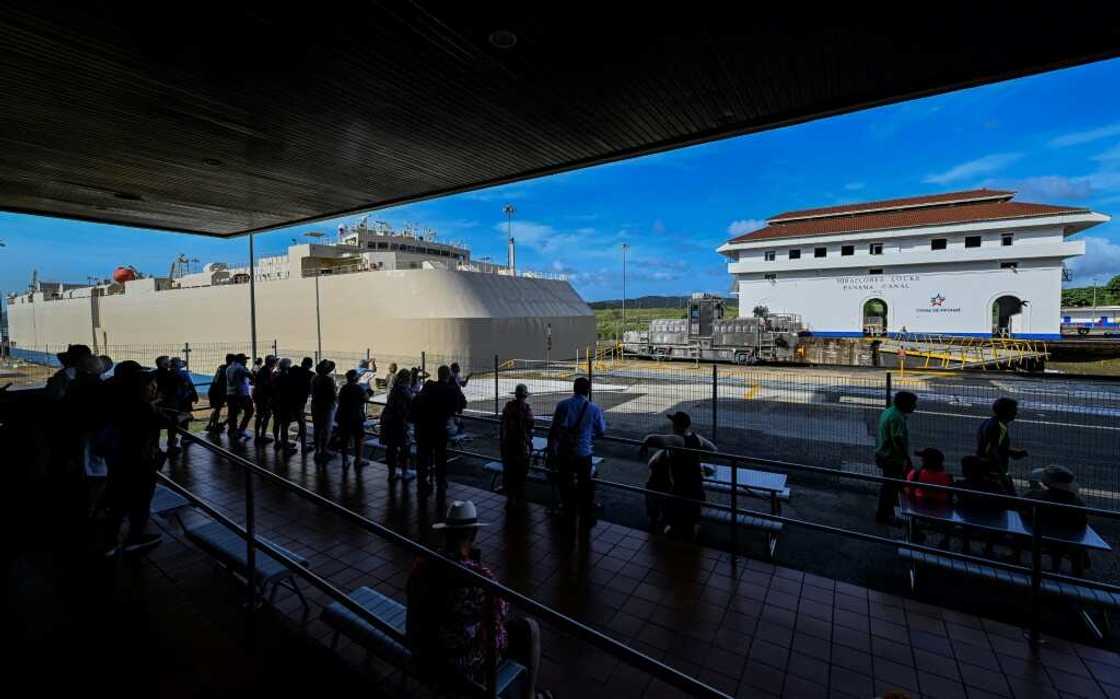 A ship passing through the Miraflores lock in the Panama Canal