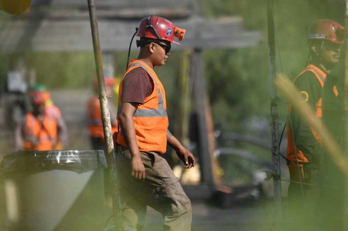Rescuers take part in an operation to try to find 10 miners trapped in northern Mexico Rescuers take part in an operation to try to find 10 miners trapped in northern Mexico
