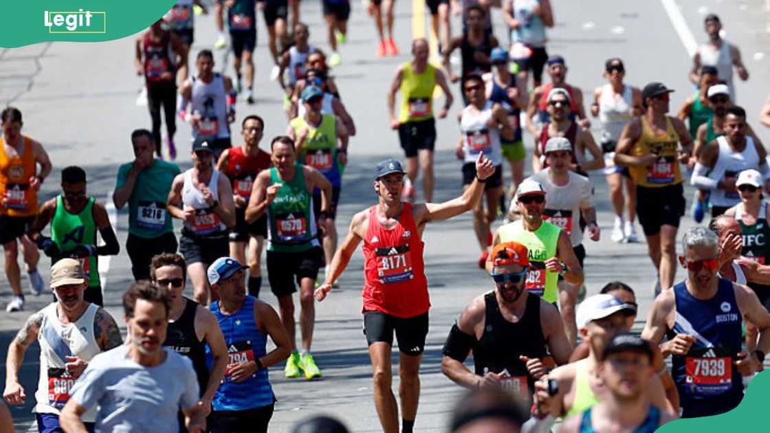 Runners start to ascend Heartbreak Hill