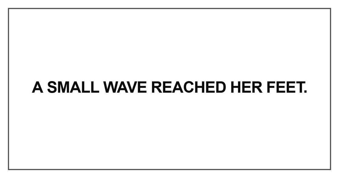A small wave reached her feet
