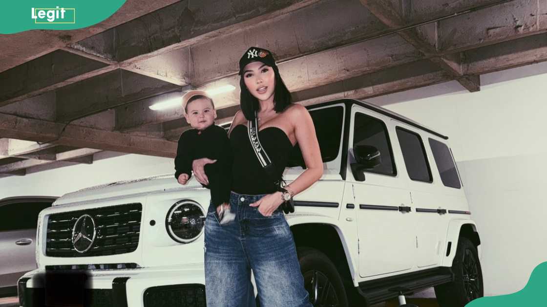 Aida Victoria Merlano with her baby at a parking garage