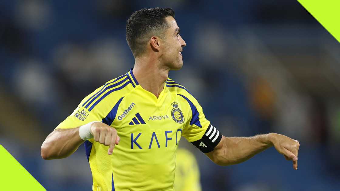 Cristiano Ronaldo celebrates as he reaches 899 career goals. Cristiano Ronaldo celebrates as he reaches 899 career goals.