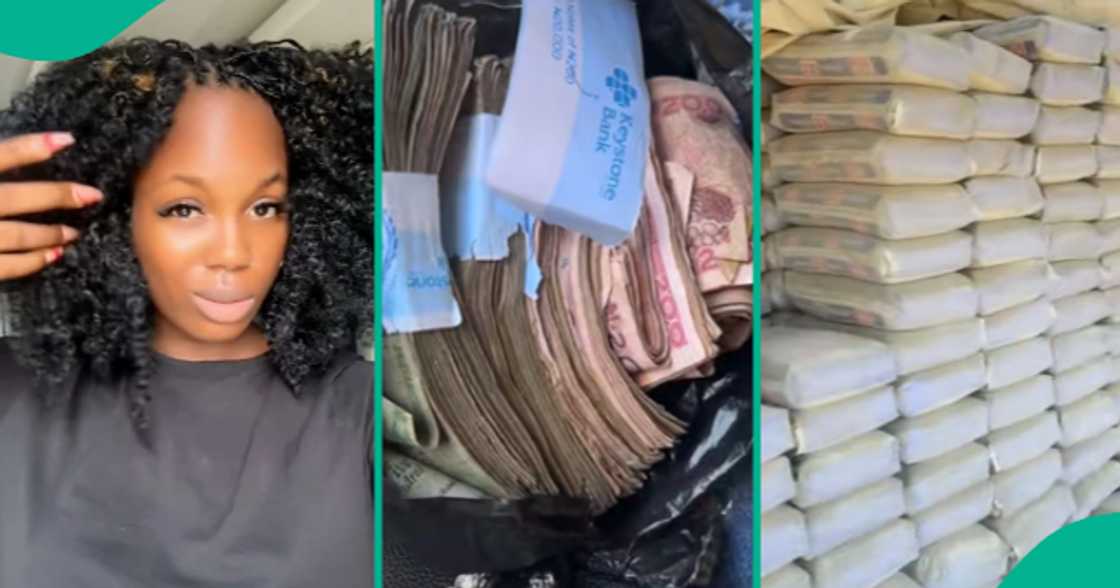 Female cement seller shows off the money she made from her business.