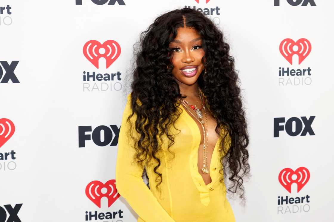 SZA poses successful  the property   country   during the iHeartRadio Music Awards astatine  Dolby Theatre successful  Hollywood, California