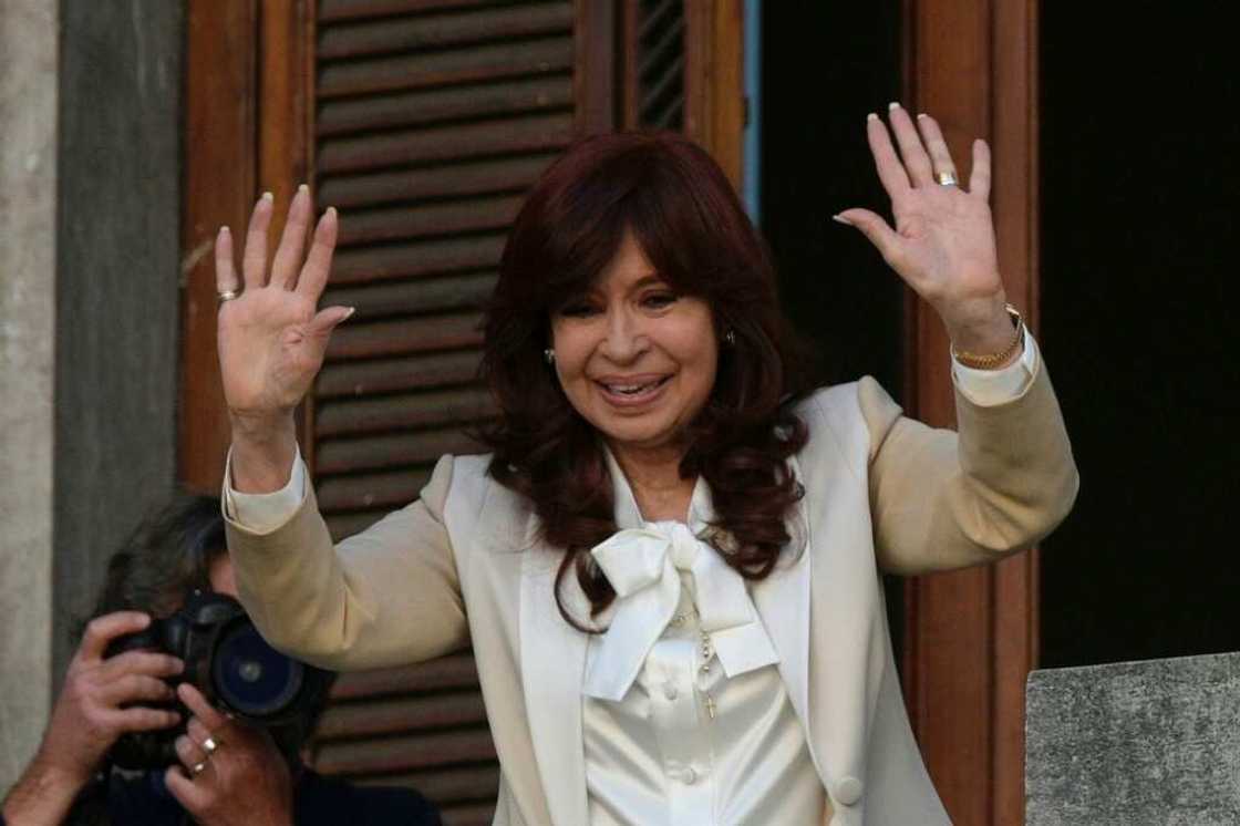 Argentine Vice-President Cristina Kirchner waves to supporters from the senate balcony a day after prosecutors recommend she be jailed for 12 years for graft Argentine Vice-President Cristina Kirchner waves to supporters from the senate balcony a day after prosecutors recommend she be jailed for 12 years for graft