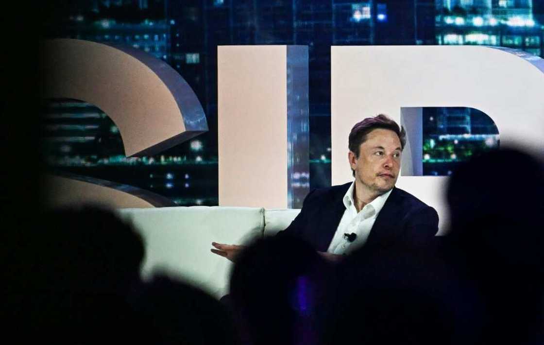 Twitter CEO Elon Musk, seen at the Twitter 2.0 conference in Florida April 18, 2023, hyped up the social media giant's new content moderation policy Twitter CEO Elon Musk, seen at the Twitter 2.0 conference in Florida April 18, 2023, hyped up the social media giant's new content moderation policy