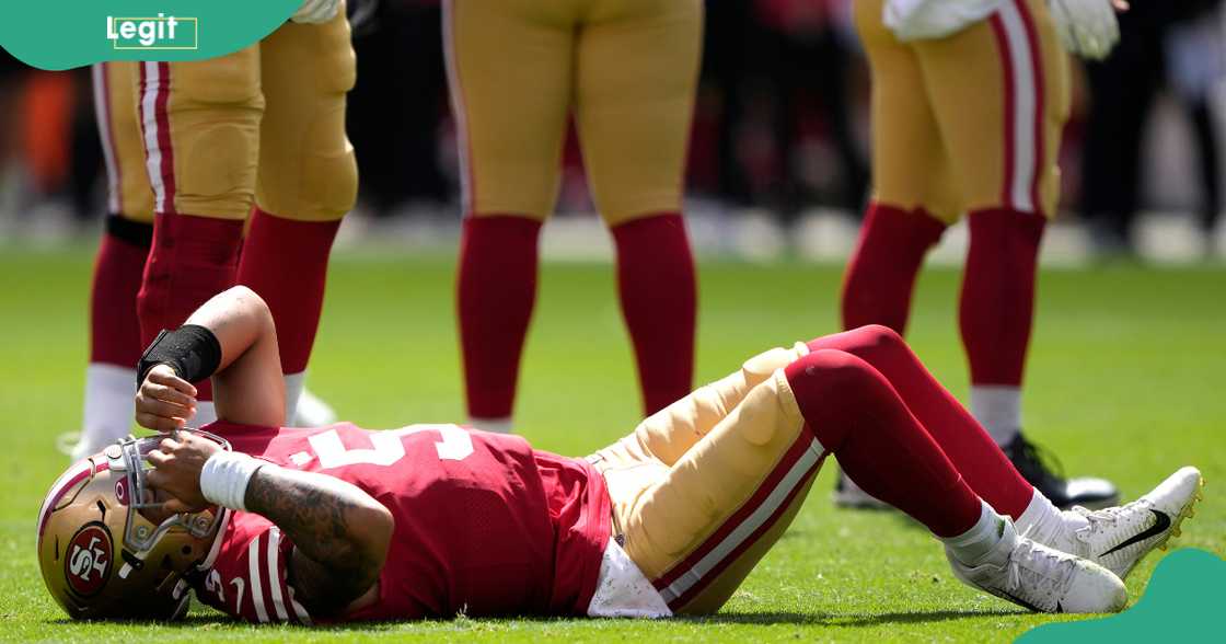 Trey Lance of the San Francisco 49ers lays on the ground after an apparent injury Trey Lance of the San Francisco 49ers lays on the ground after an apparent injury