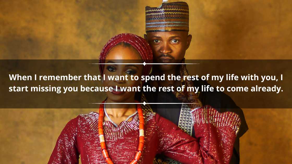 A happy couple in elegant traditional outfits