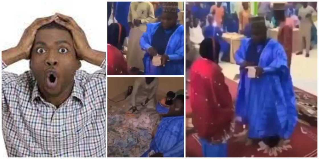 Video shows man taking back all the money he sprayed bride who refused to smile at her wedding Video shows man taking back all the money he sprayed bride who refused to smile at her wedding