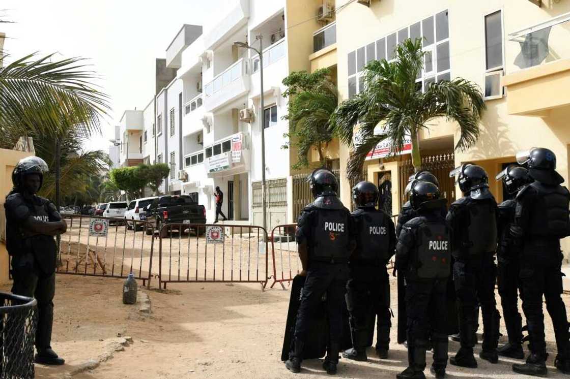 Police closed off the street leading to Senegal opposition leader Ousmane Sonko's home in Dakar on June 17, 2022 Police closed off the street leading to Senegal opposition leader Ousmane Sonko's home in Dakar on June 17, 2022