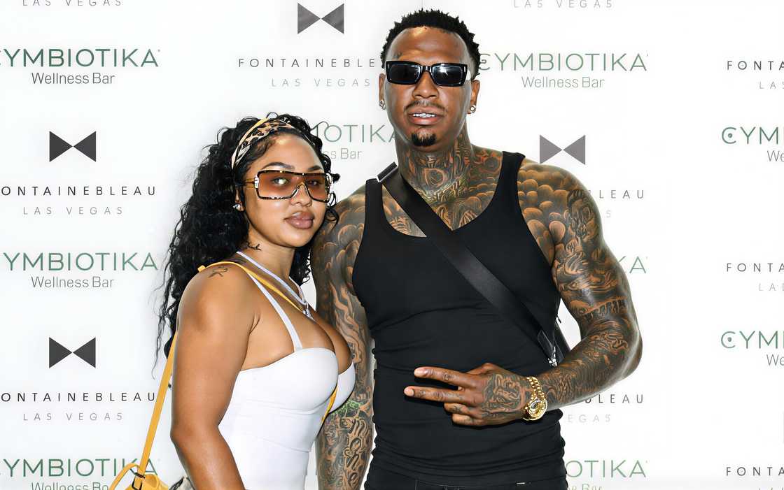 Ari Fletcher and Moneybagg Yo pose on the red carpet Ari Fletcher and Moneybagg Yo pose on the red carpet