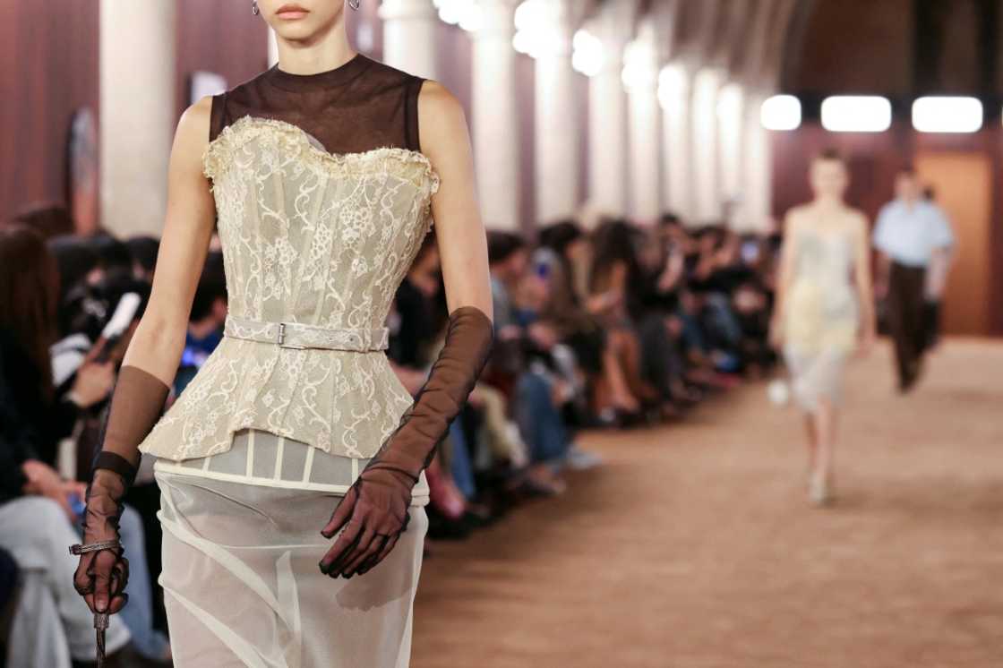 A model wearing a corset during Paris Fashion Week which wrapped up last week A model wearing a corset during Paris Fashion Week which wrapped up last week